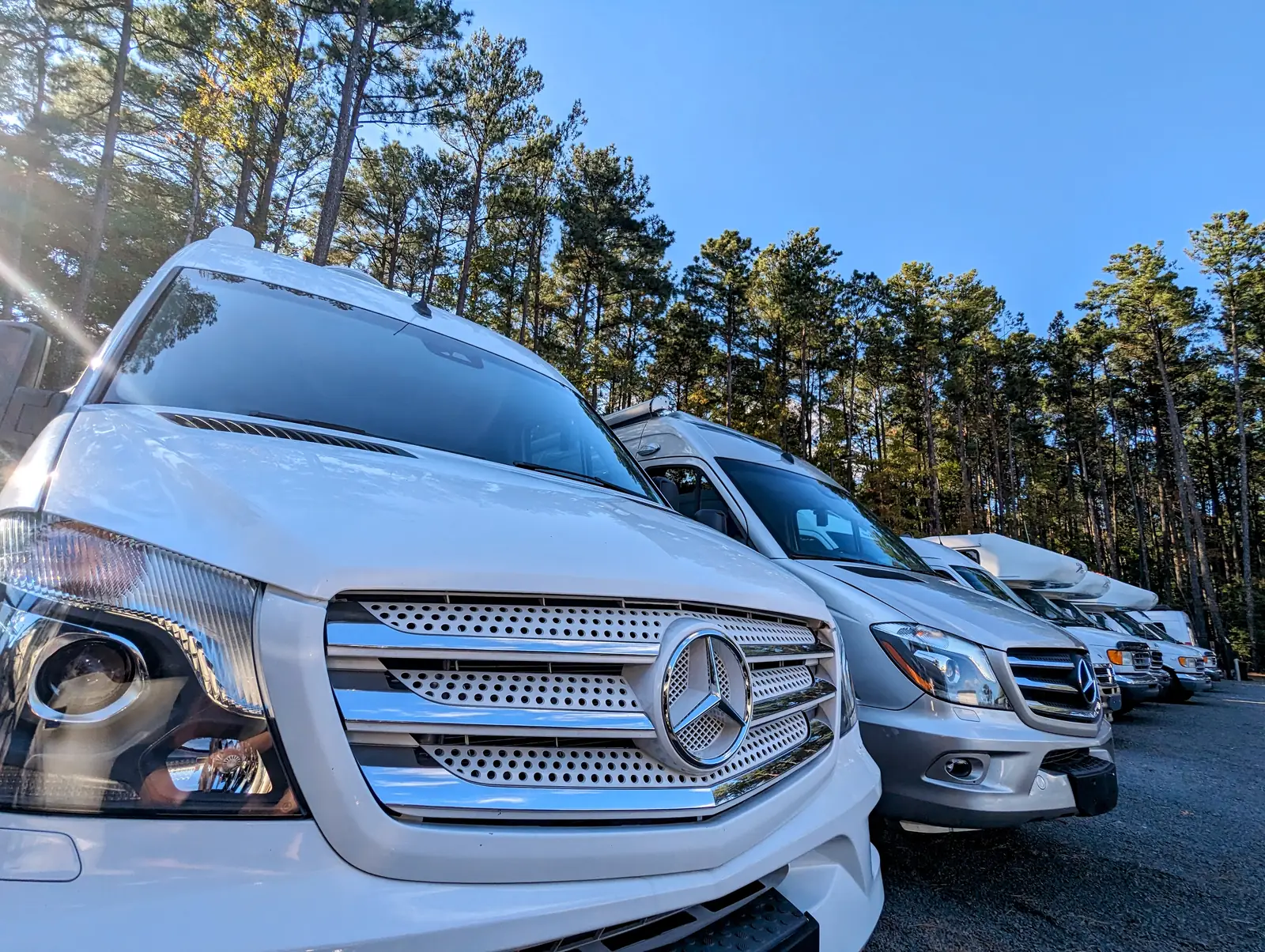 Row of Mercedes Sprinter Class B camper vans for sale on the Stream RV lot in Creedmoor, NC